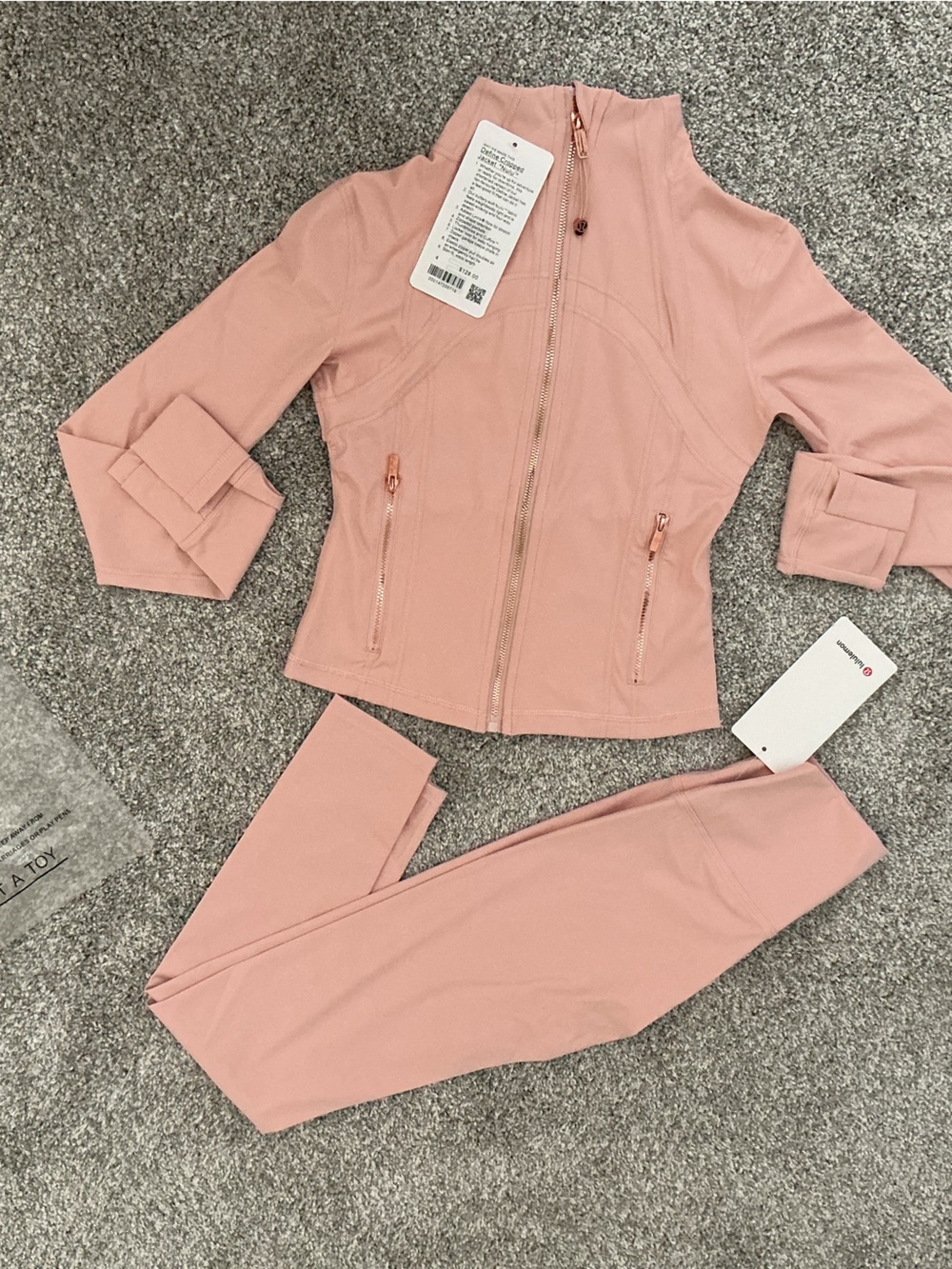 Blush Pink Off-Shoulder Jumpsuit with Front Zipper